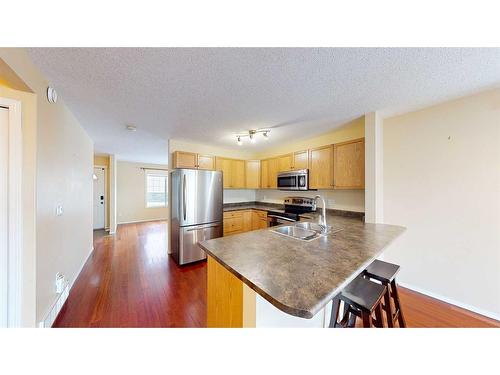 38 Northlands Lane Ne, Medicine Hat, AB - Indoor Photo Showing Kitchen With Double Sink