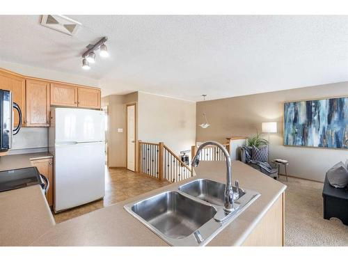 73 Sunrise Way Sw, Medicine Hat, AB - Indoor Photo Showing Kitchen With Double Sink