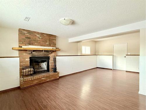 73 Ross Haven Crescent Se, Medicine Hat, AB - Indoor With Fireplace