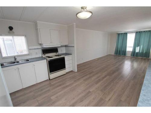 160 Anson Avenue Sw, Medicine Hat, AB - Indoor Photo Showing Kitchen With Double Sink