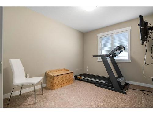 606 Somerside View Se, Medicine Hat, AB - Indoor Photo Showing Gym Room