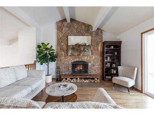 252 Seven Persons Drive Sw, Medicine Hat, AB - Indoor Photo Showing Living Room With Fireplace