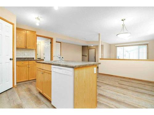 3-102 Sunwood Crescent Sw, Medicine Hat, AB - Indoor Photo Showing Kitchen With Double Sink