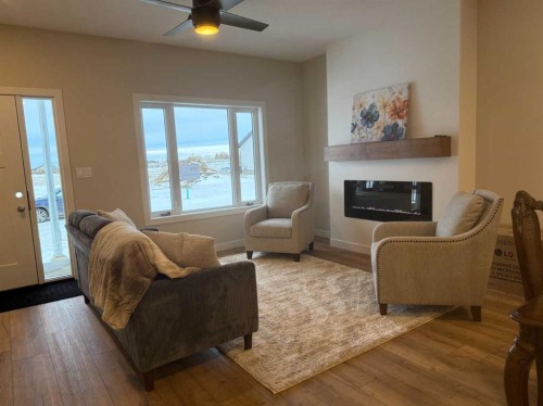 171 Parkview Crescent West, Bow Island, AB - Indoor Photo Showing Living Room With Fireplace