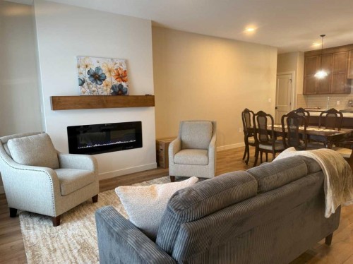 171 Parkview Crescent West, Bow Island, AB - Indoor Photo Showing Living Room With Fireplace