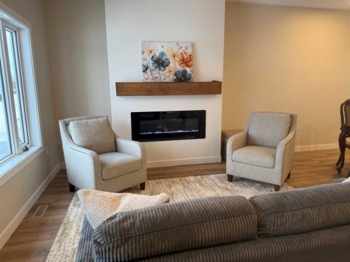 171 Parkview Crescent West, Bow Island, AB - Indoor Photo Showing Living Room With Fireplace