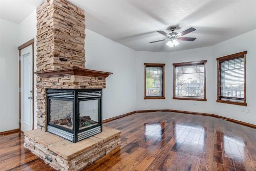 1048 Eagle Ridge Drive, Dunmore, AB - Indoor Photo Showing Other Room With Fireplace