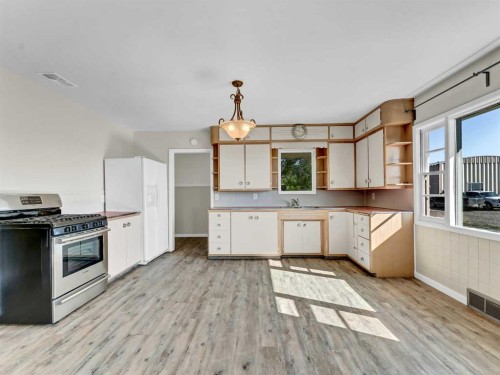 1-13402 Range Road 75, Rural Cypress County, AB - Indoor Photo Showing Kitchen With Double Sink