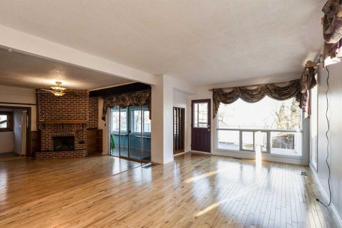 176 1 Street Sw, Medicine Hat, AB - Indoor With Fireplace