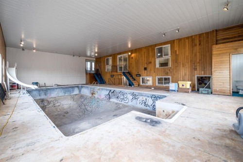 116 6 Avenue West, Empress, AB - Indoor Photo Showing Other Room With In Ground Pool