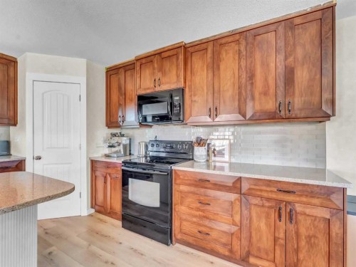 9-12301 Range Road 51A, Rural Cypress County, AB - Indoor Photo Showing Kitchen