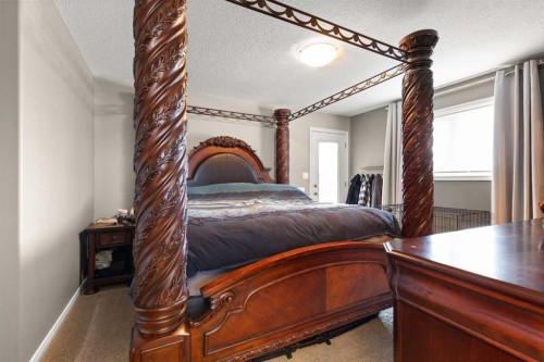 404 Jesmond Place Sw, Redcliff, AB - Indoor Photo Showing Bedroom