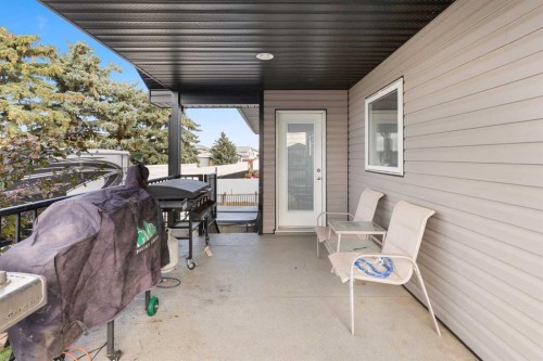 404 Jesmond Place Sw, Redcliff, AB - Outdoor With Deck Patio Veranda With Exterior