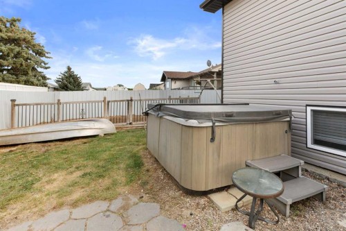 404 Jesmond Place Sw, Redcliff, AB - Outdoor With Deck Patio Veranda With Exterior
