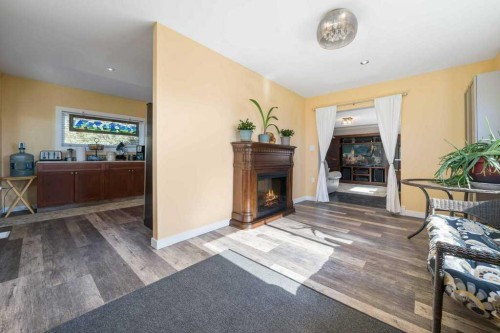 12323 Range Road 74, Rural Cypress County, AB - Indoor With Fireplace