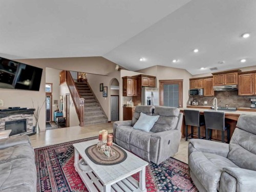 264 Sierra Road Sw, Medicine Hat, AB - Indoor Photo Showing Living Room With Fireplace