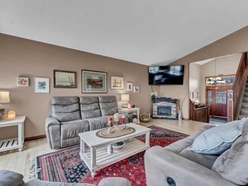 264 Sierra Road Sw, Medicine Hat, AB - Indoor Photo Showing Living Room With Fireplace