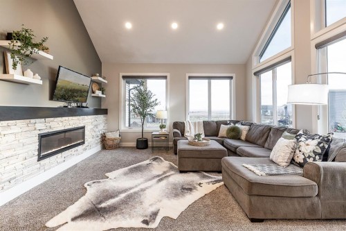 87-12107 Range Road 74, Rural Cypress County, AB - Indoor Photo Showing Living Room With Fireplace