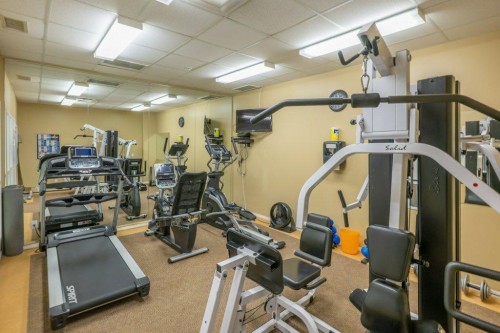 108 River Ridge Drive Nw, Medicine Hat, AB - Indoor Photo Showing Gym Room