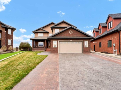 150 Desert Blume Crescent, Desert Blume, AB - Outdoor With Facade