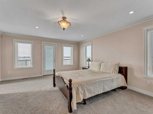 150 Desert Blume Crescent, Desert Blume, AB - Indoor Photo Showing Bedroom