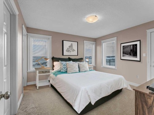 150 Desert Blume Crescent, Desert Blume, AB - Indoor Photo Showing Bedroom