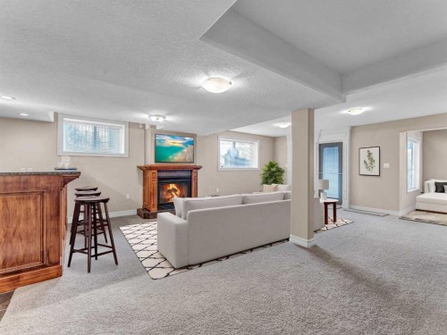 150 Desert Blume Crescent, Desert Blume, AB - Indoor With Fireplace