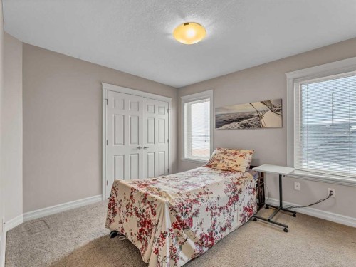 150 Desert Blume Crescent, Desert Blume, AB - Indoor Photo Showing Bedroom