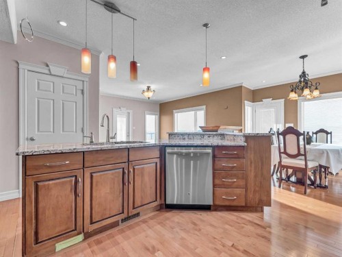 150 Desert Blume Crescent, Desert Blume, AB - Indoor Photo Showing Kitchen With Upgraded Kitchen
