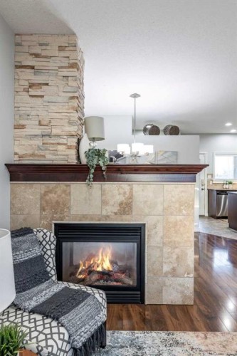 129 Ranchman Crescent Ne, Medicine Hat, AB - Indoor Photo Showing Living Room With Fireplace