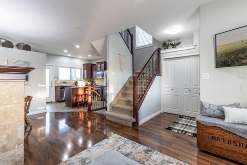 129 Ranchman Crescent Ne, Medicine Hat, AB - Indoor Photo Showing Living Room With Fireplace