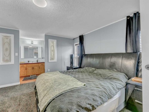 2-12006 Range Road 43, Rural Cypress County, AB - Indoor Photo Showing Bedroom