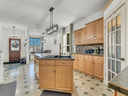 27 4 Street Sw, Medicine Hat, AB - Indoor Photo Showing Kitchen With Double Sink