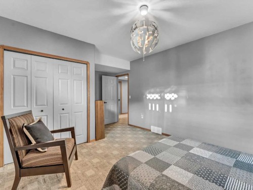 28 Stark Mews Se, Medicine Hat, AB - Indoor Photo Showing Bedroom