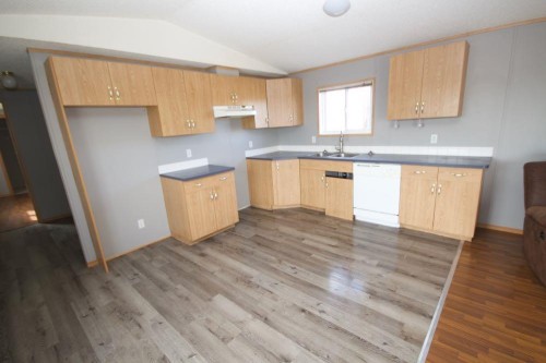 614 Arthur Street, Walsh, AB - Indoor Photo Showing Kitchen With Double Sink