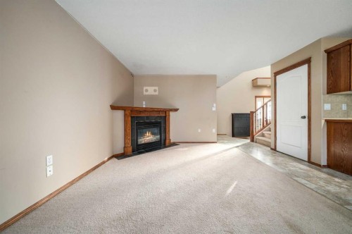 197 Vista Road, Medicine Hat, AB - Indoor Photo Showing Living Room With Fireplace