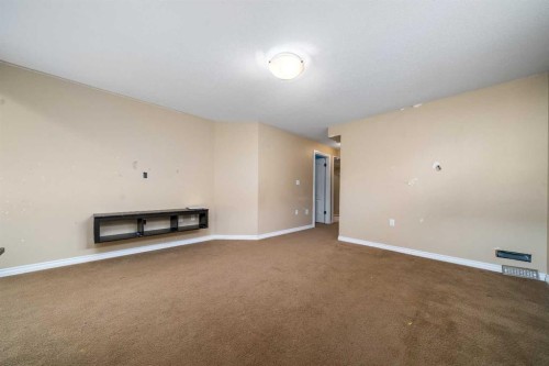 197 Vista Road, Medicine Hat, AB - Indoor Photo Showing Other Room With Fireplace