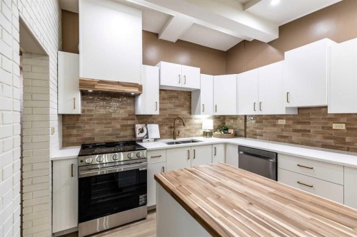 150 11 Street Ne, Medicine Hat, AB - Indoor Photo Showing Kitchen With Double Sink