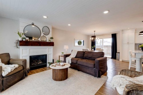 157 Calder Road Se, Medicine Hat, AB - Indoor Photo Showing Living Room With Fireplace