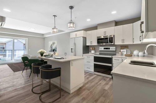 302-21 Ranchlands Boulevard Ne, Medicine Hat, AB - Indoor Photo Showing Kitchen With Double Sink With Upgraded Kitchen