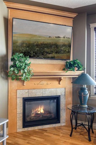 770 Eagle Ridge Drive, Dunmore, AB - Indoor Photo Showing Living Room With Fireplace