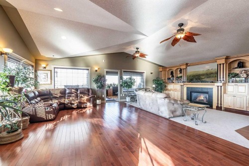 770 Eagle Ridge Drive, Dunmore, AB - Indoor Photo Showing Living Room With Fireplace