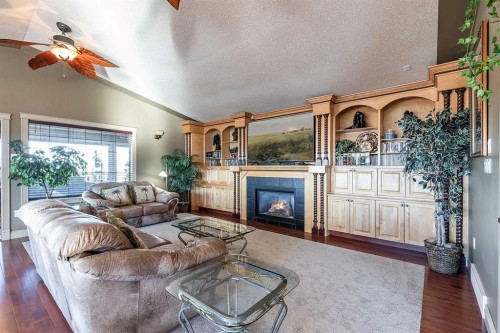770 Eagle Ridge Drive, Dunmore, AB - Indoor Photo Showing Living Room With Fireplace