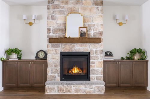 33080 Range Road 61, Rural Mountain View County, AB - Indoor Photo Showing Living Room With Fireplace