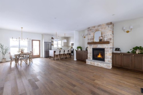 33080 Range Road 61, Rural Mountain View County, AB - Indoor Photo Showing Living Room With Fireplace