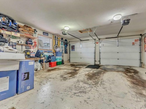 9 Riverview Green Se, Redcliff, AB - Indoor Photo Showing Garage