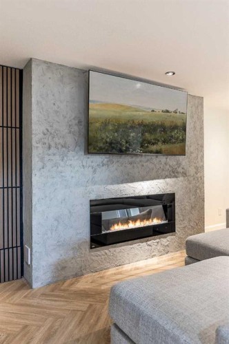 683 7 Street Sw, Medicine Hat, AB - Indoor Photo Showing Living Room With Fireplace