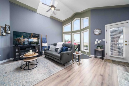 110 Redcliff Way Sw, Redcliff, AB - Indoor Photo Showing Living Room