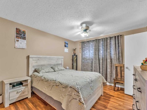 12002 Range Road 65, Rural Cypress County, AB - Indoor Photo Showing Bedroom