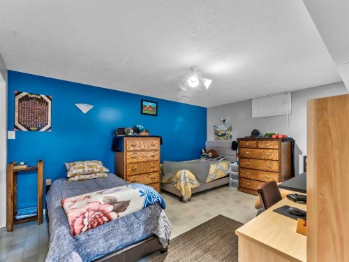 12002 Range Road 65, Rural Cypress County, AB - Indoor Photo Showing Bedroom